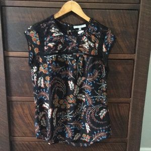 Black floral sleeveless blouse